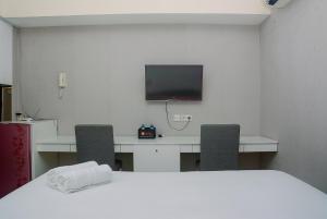 Cozy Studio Room Taman Melati Margonda Apartment By Travelio