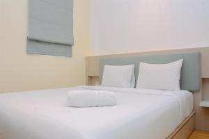 Warm and Cozy 2BR Signature Park Grande Apartment By Travelio