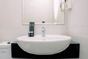 Warm and Cozy 2BR Signature Park Grande Apartment By Travelio