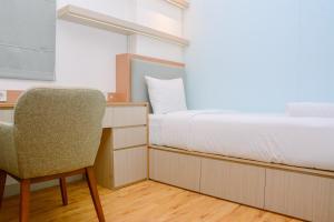 Warm and Cozy 2BR Signature Park Grande Apartment By Travelio