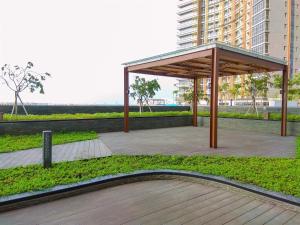 Nice and Homey 1BR at Gold Coast Apartment By Travelio