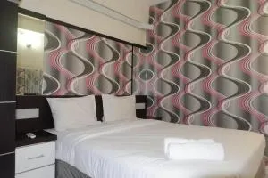 Minimalist 2BR Apartment at Dian Regency By Travelio - Gebangoutih