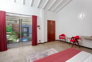 Hasthri Boutique Red Chalet in Ahangama with pool Near Beach