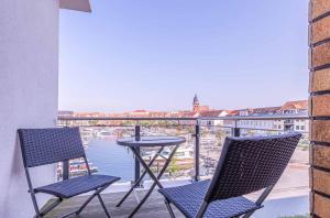 Möwe - Apartment in der Hafenresidenz mit Balkon & Wellness