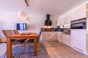 Möwe - Apartment in der Hafenresidenz mit Balkon & Wellness