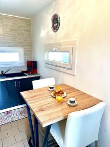 Appartements Duplex Le Chant des Oiseaux : photos des chambres