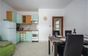 Nice Apartment In Rabac With Kitchen