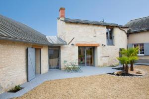 Maisons de vacances La Palmeraie de Distre - Avec jardin : photos des chambres