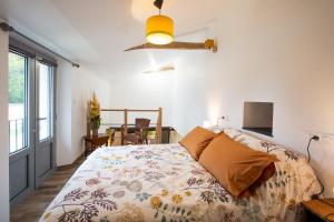 Maisons de vacances La Palmeraie de Distre - Avec jardin : photos des chambres