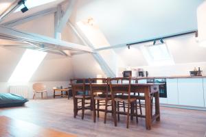 Appartements Le Nid dAigle - Spacieux logement sous les toits : photos des chambres