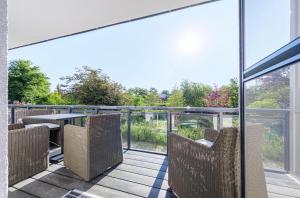 Achterndieck - Modernes 5-Sterne Erdgeschoss-Apartment mit Balkon