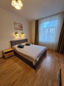 Standard Studio Apartment - Fourth Floor without Elevator room in Lāčplēša Central Apartments
