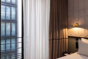 Hotels Hotel Grand Coeur Latin : photos des chambres