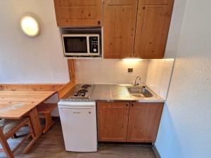 Studio au cœur de la station avec terrasse, skis aux pieds, pour 4 personnes - FR-1-265-346