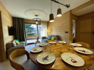Appartements Appartement 8 personnes neuf au coeur du village : photos des chambres