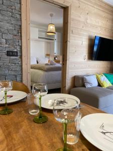 Appartements Appartement 8 personnes neuf au coeur du village : photos des chambres