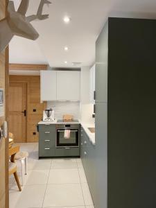 Appartements Appartement 8 personnes neuf au coeur du village : photos des chambres