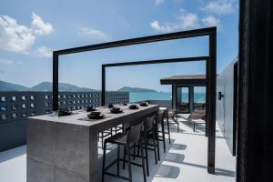 Three Double U - Kalim Sea View