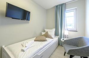5 Sterne Ferienwohnung Stranddomizil mit Eckbalkon und Boddenblick
