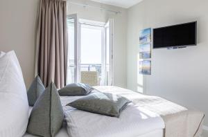 Dünenlounge - 5 Sterne Ferienwohnung mit West-Balkon und fantastischem Blick über den Deich