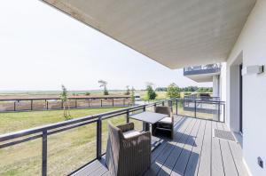 Kleine Strandmuschel mit Südbalkon