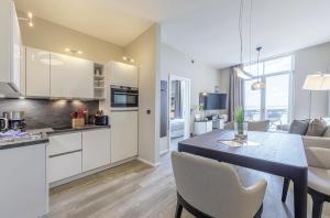 Kleine Welle - Haustierfreundliches Zwei-Zimmer Apartment mit Südbalkon und Platz für drei Personen im ersten Obergeschoss