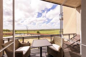 Kleine Welle - Haustierfreundliches Zwei-Zimmer Apartment mit Südbalkon und Platz für drei Personen im ersten Obergeschoss