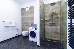 Ostseeglück - 5-Sterne-Ferienwohnung mit Südbalkon und Blick zum Saaler Bodden