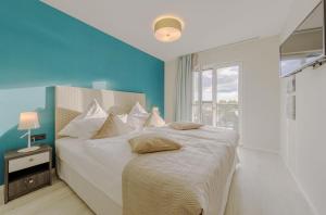 Sommerperle - 5-Sterne Ferienwohnung im Strandhaus-Stil mit Wellnessbereich und Ostseeblick