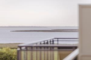 Sommerperle - 5-Sterne Ferienwohnung im Strandhaus-Stil mit Wellnessbereich und Ostseeblick