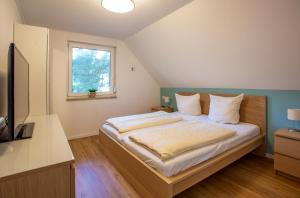 Merlin Ausguck - Familienfreundliche Dachgeschosswohnung mit Morgensonne