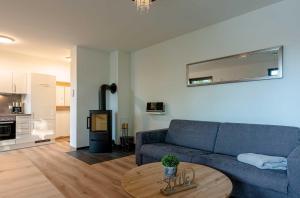 Lotusblume - 5 Sterne Ferienunterkunft mit möblierter Terrasse am Krakower See