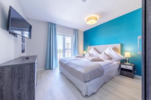 5 Sterne Ferienwohnung Boddenkieker mit großer Eckterrasse und Boddenblick