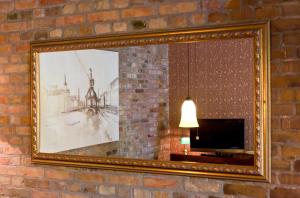 Ferienwohnung Lilie mit Balkon in einer geschmackvoll sanierten Backsteinmühle