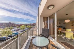 Ferienwohnung Hafenglück- Ideal für Familien mit Balkon und Yachthafenblick