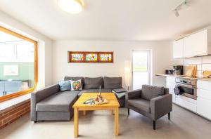 Ferienhaus "Bunter Fisch" - direkt am Deich, Strandübergang 19