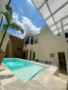 Casa com piscina, churrasqueira e terraço com vista pro mar! - 曼加拉蒂巴