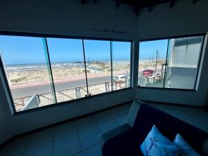 Moradas do Pier 2- apartamento a passos da areia, com vista perfeita da praia e plataforma em TramandaĆ!