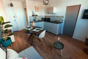 Appartements Cocon clermontois - Moderne et cosy : photos des chambres