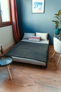 Appartements Cocon clermontois - Moderne et cosy : photos des chambres