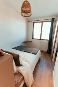 Appartements Cocon clermontois - Moderne et cosy : photos des chambres