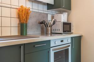 Appartements La Petite Jungle Romantique - Balneo et Detente : photos des chambres