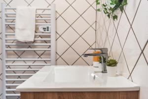 Appartements La Petite Jungle Romantique - Balneo et Detente : photos des chambres