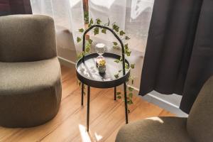 Appartements La Petite Jungle Romantique - Balneo et Detente : photos des chambres