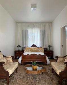 Casa super aconchegante com 5 Suítes e piscina!