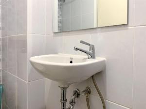 Compact Minimalist Studio at Tokyo Riverside PIK 2 Apartment By Travelio