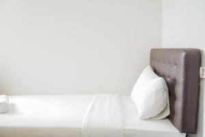 Fully Furnished with Comfortable Design 3BR Asatti Apartment By Travelio