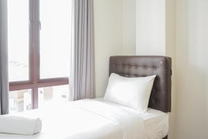 Fully Furnished with Comfortable Design 3BR Asatti Apartment By Travelio