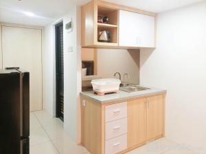 Comfy and Nice Studio at 27th Floor De Prima Apartment By Travelio