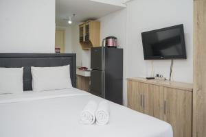 Comfort Studio Apartment M-Town Residence By Travelio